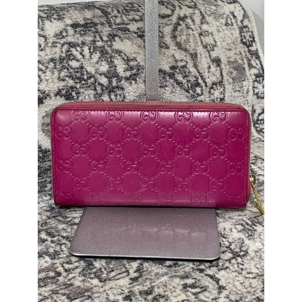 Gucci Guccissima Bow Zip Around Long Wallet in Fuschia